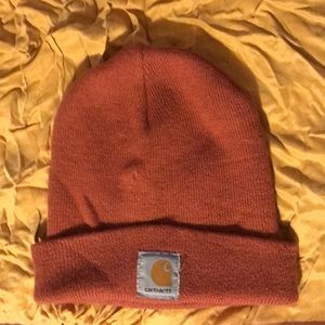 Gently worn rust colored carhartt beanie